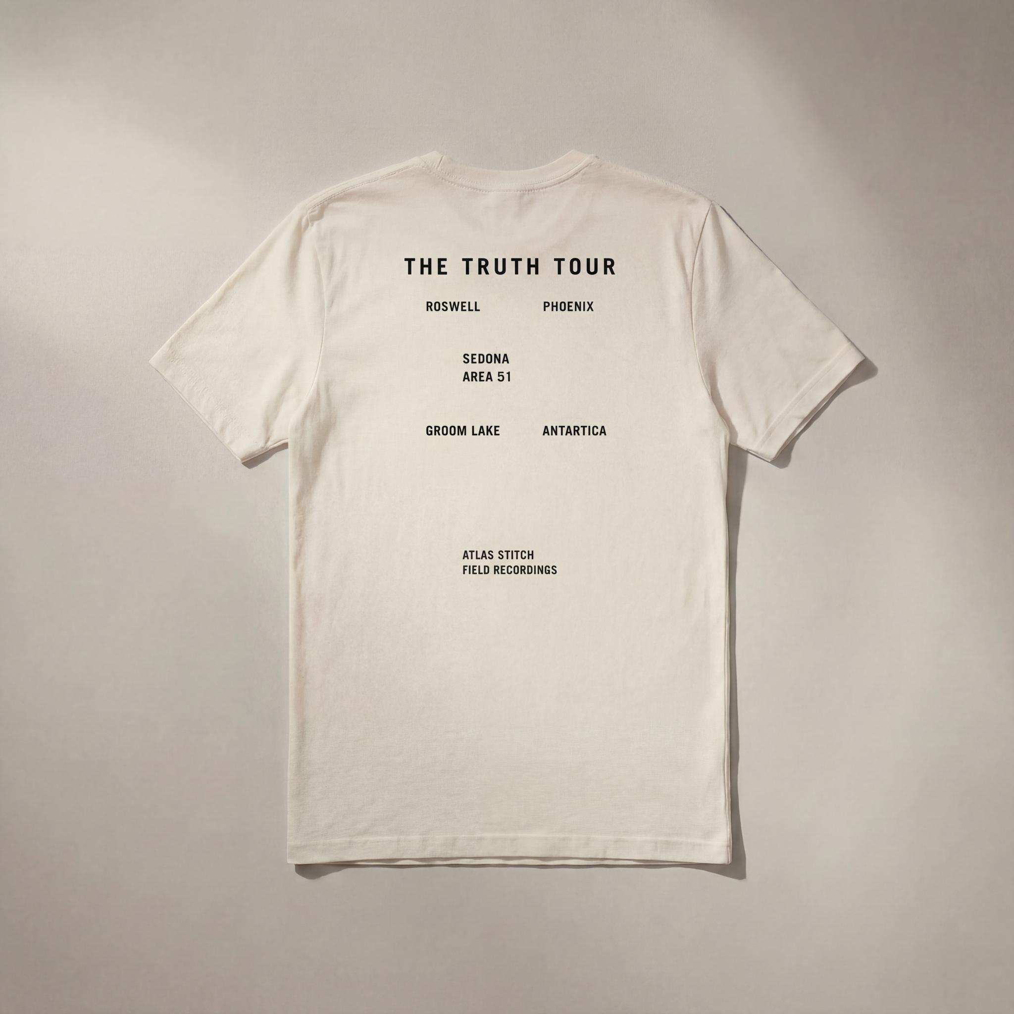 VintageWhiteTee They Know graphic tee with black back design.