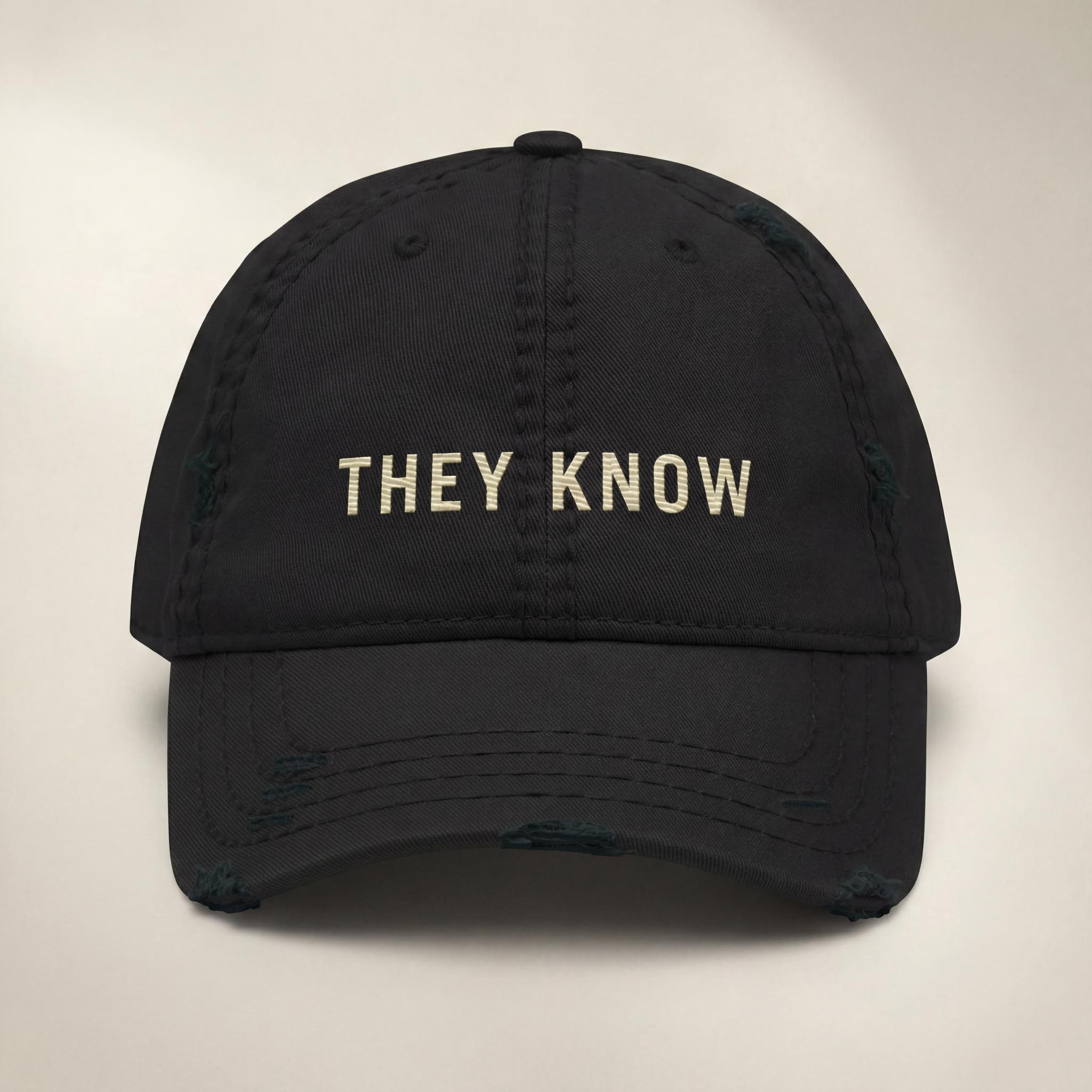 Black THEY KNOW embroidered hat from the Atlas Stitch They Know Capsule.
