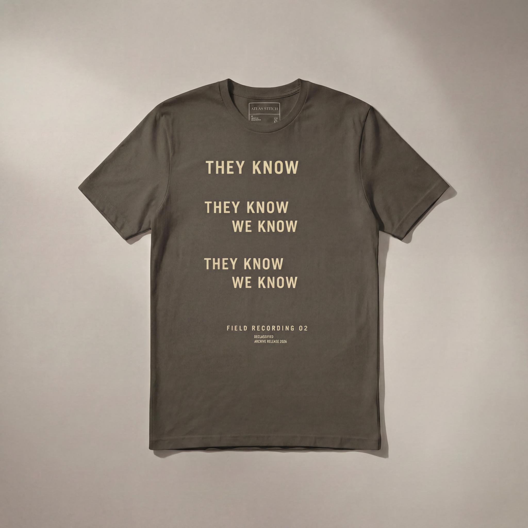 ArmyGreenTee They Know We Know graphic tee with front design visible.