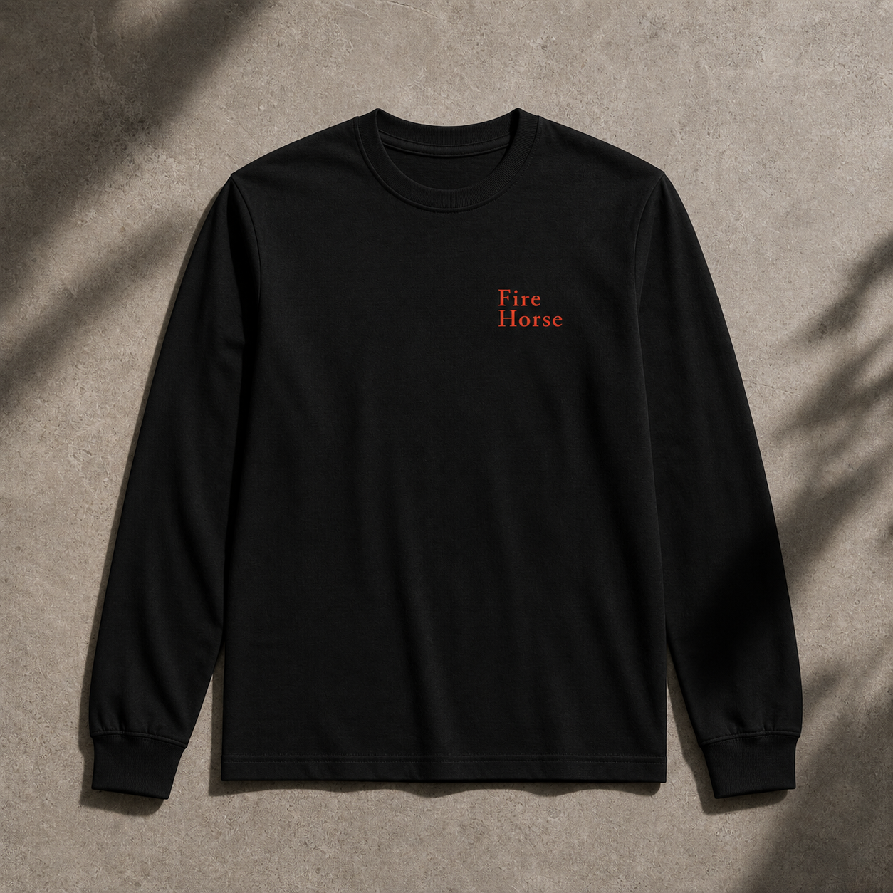 Black Fire Horse long sleeve tee front view with DTG-printed chest wordmark