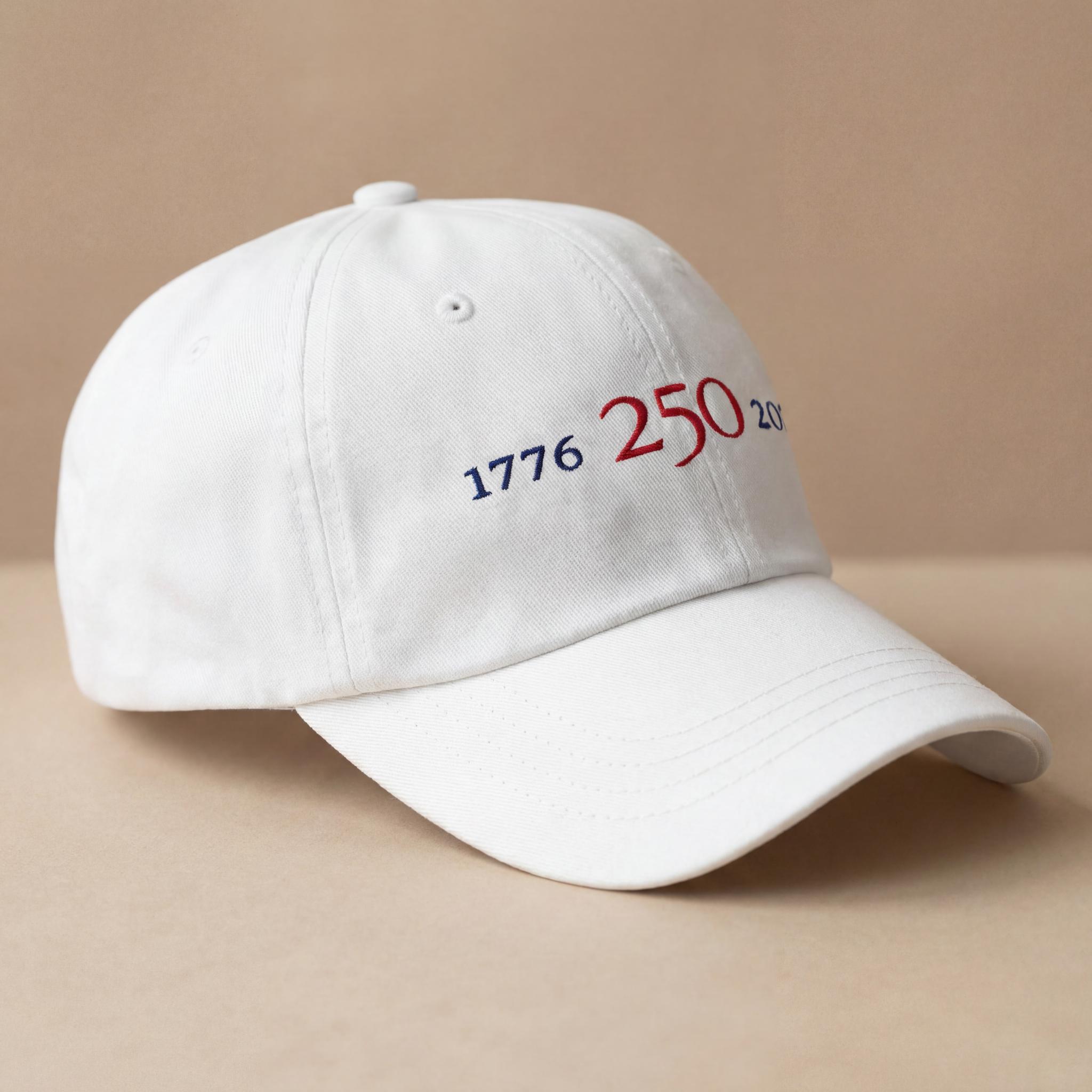 White 1776–2026 embroidered hat shown from a side angle.