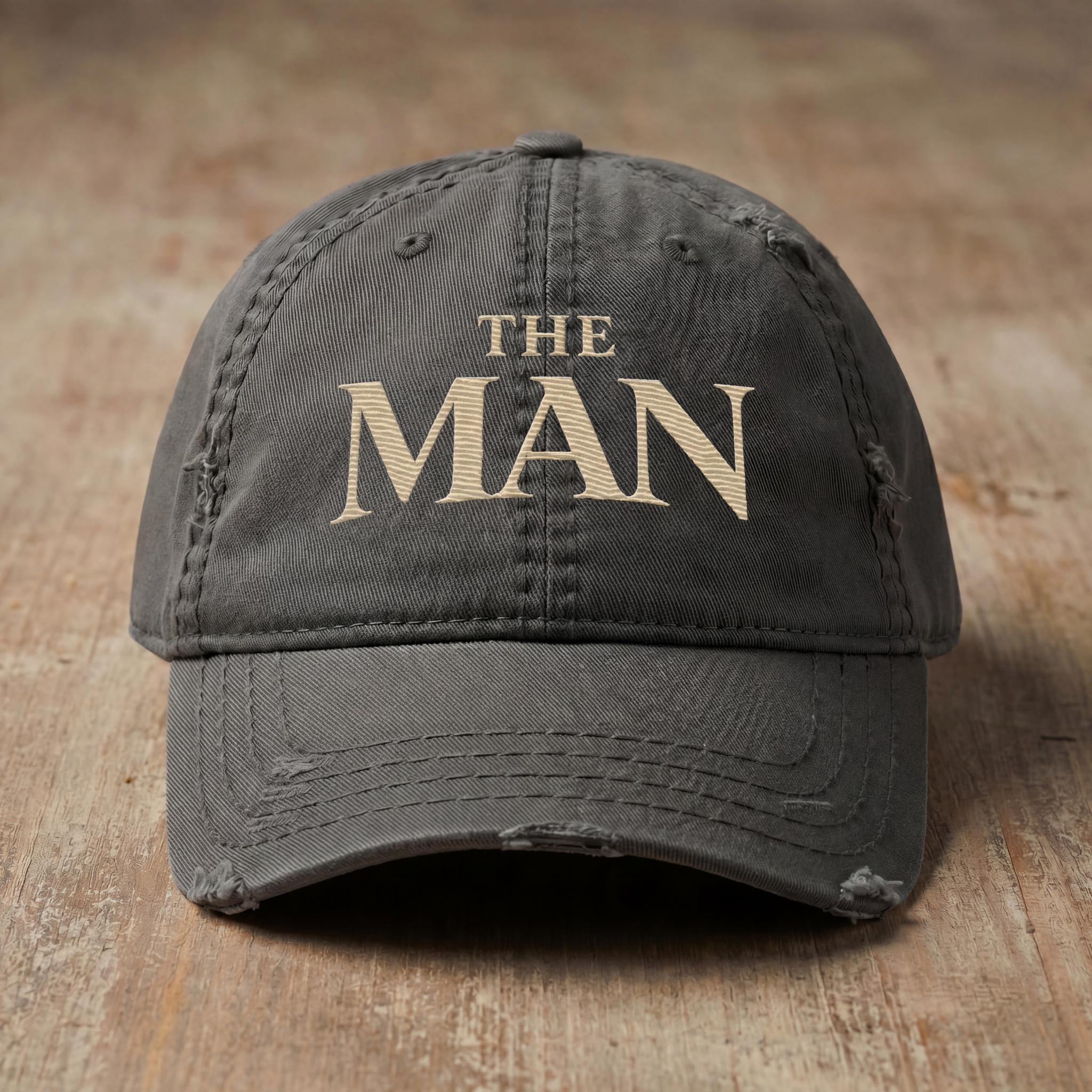 Charcoal THE MAN embroidered hat from the Atlas Stitch Father Capsule.