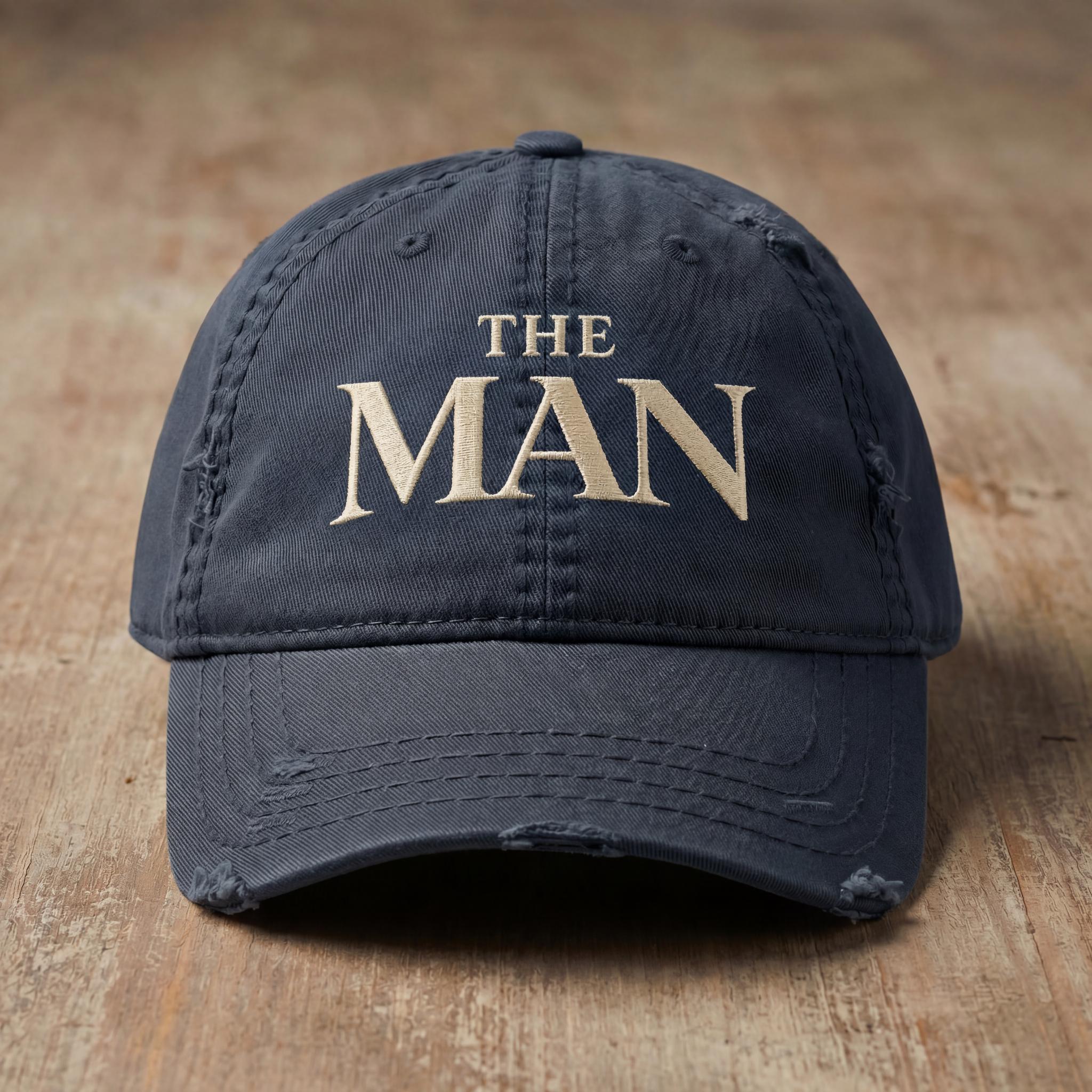 Navy THE MAN embroidered hat from the Atlas Stitch Father Capsule.
