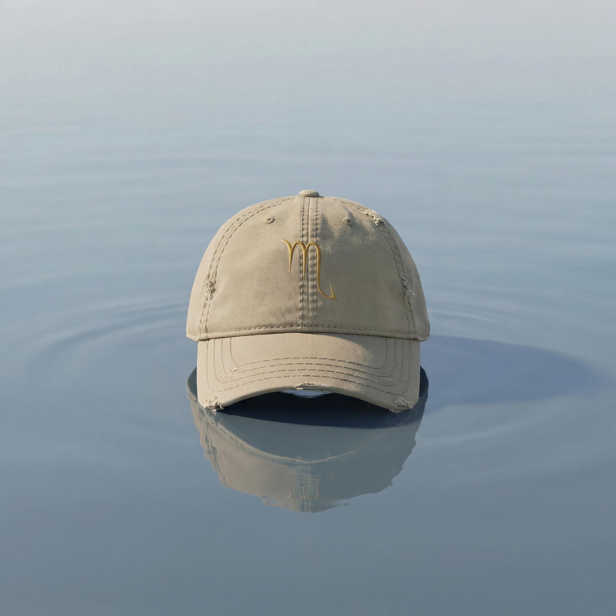 Khaki Scorpio embroidered cap from the Atlas Stitch Zodiac Capsule.