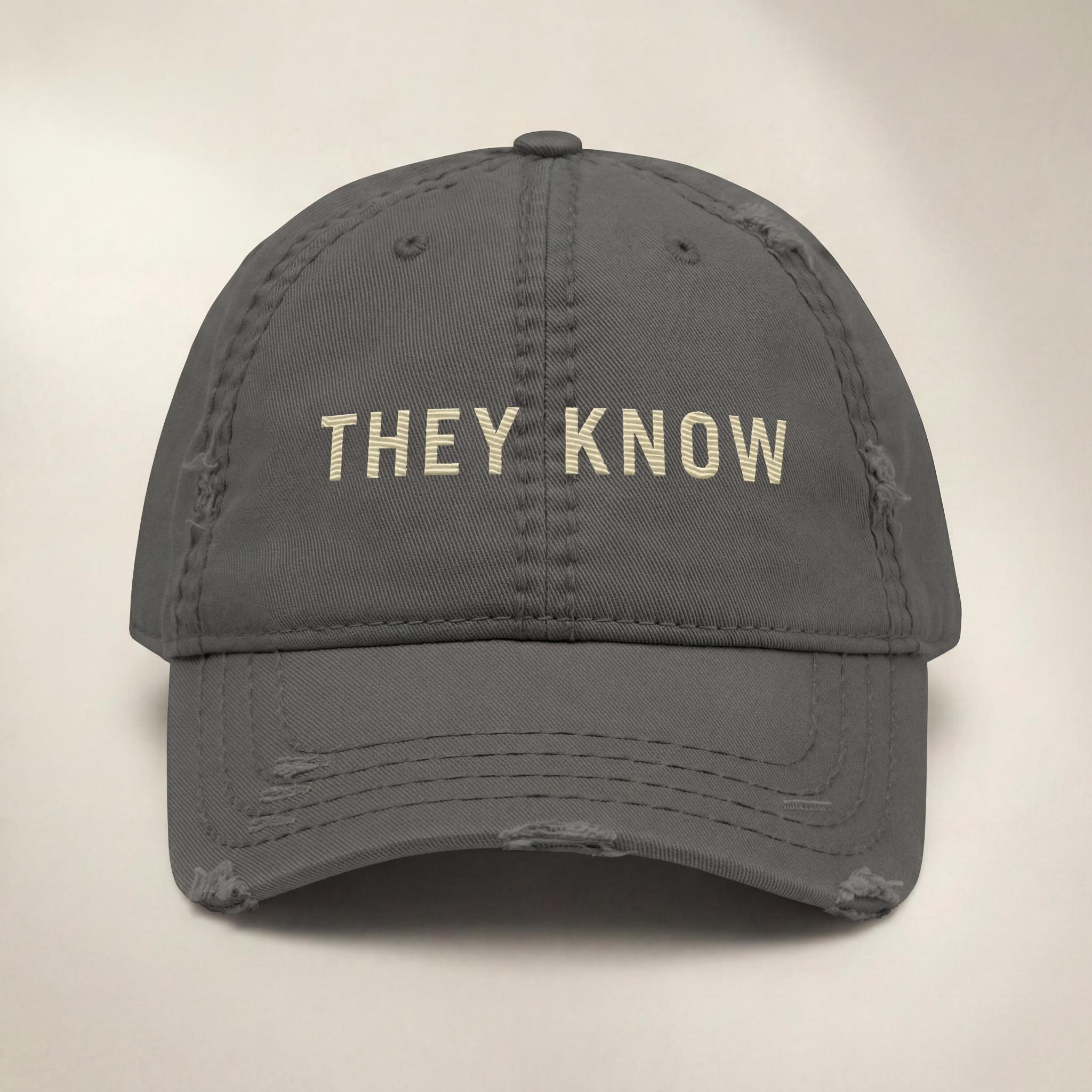 Charcoal THEY KNOW embroidered hat from the Atlas Stitch They Know Capsule.