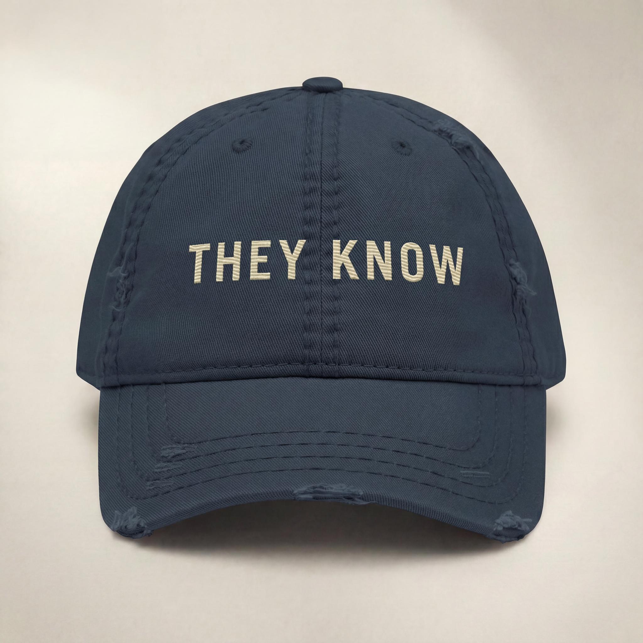 Navy THEY KNOW embroidered hat from the Atlas Stitch They Know Capsule.