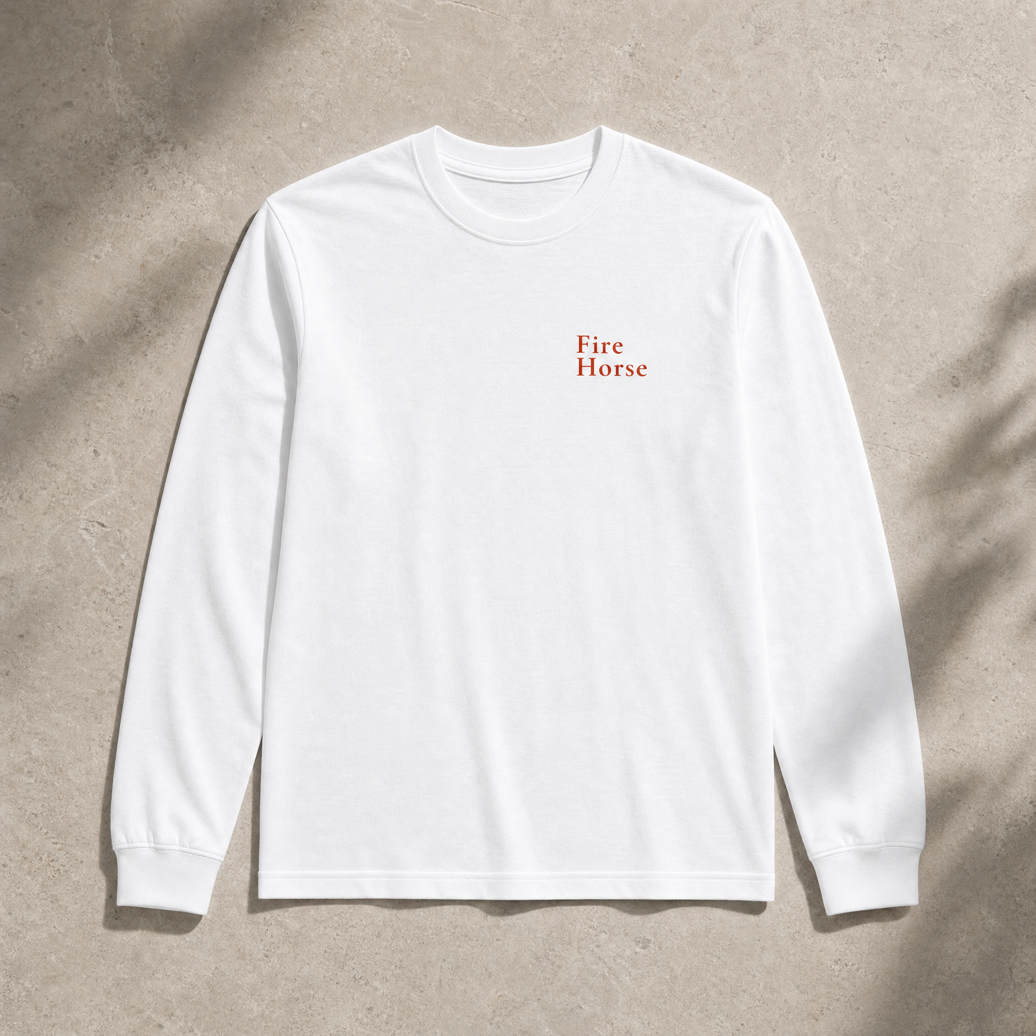 White Fire Horse long sleeve tee front view with DTG-printed chest wordmark
